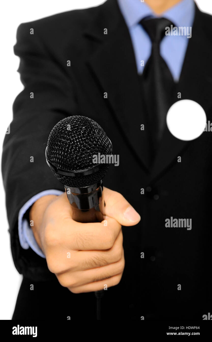 Man With Black Business Suit With Blank Pinned Button Hold Microphone 