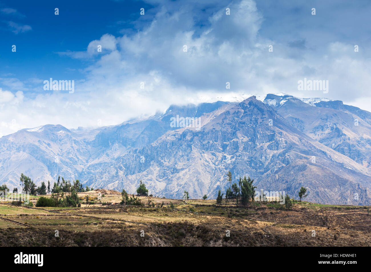 snow-capped mountains on a sunny day Stock Photo - Alamy