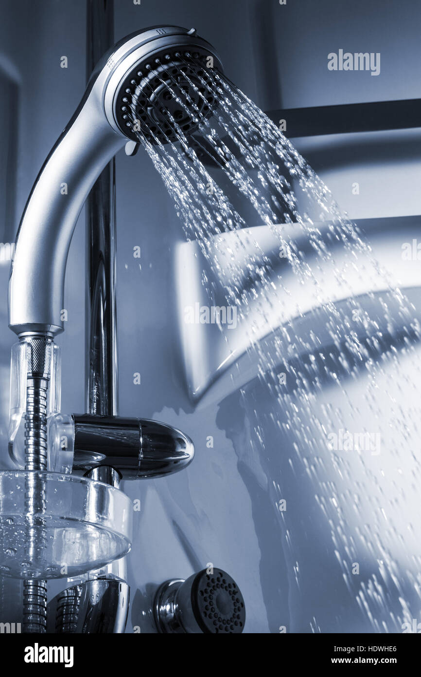 Water from the shower in the modern bathroom Stock Photo Alamy