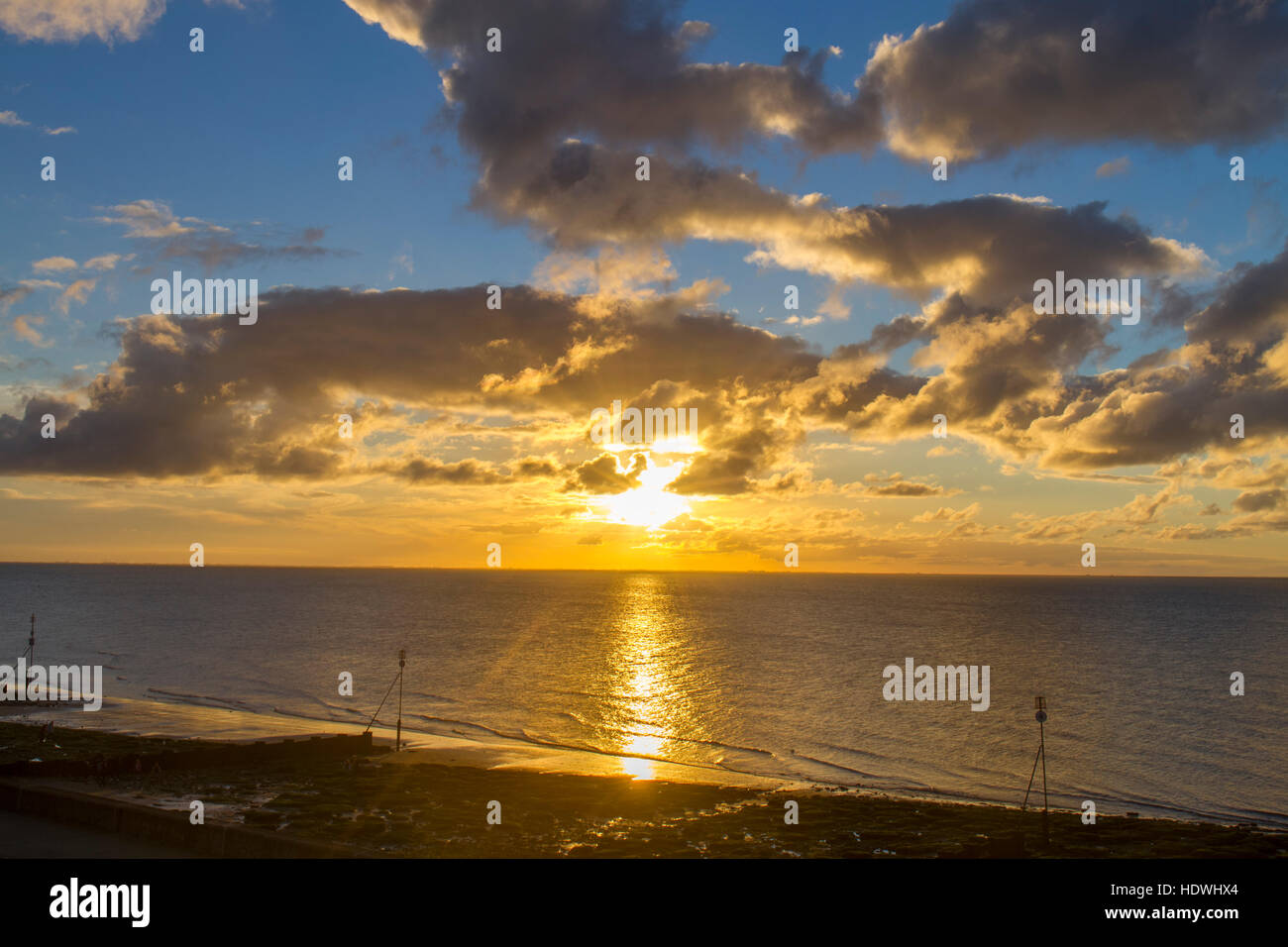 View over beach and The Wash at Sunset. Hunstanton, Norfolk, England. October. Stock Photo