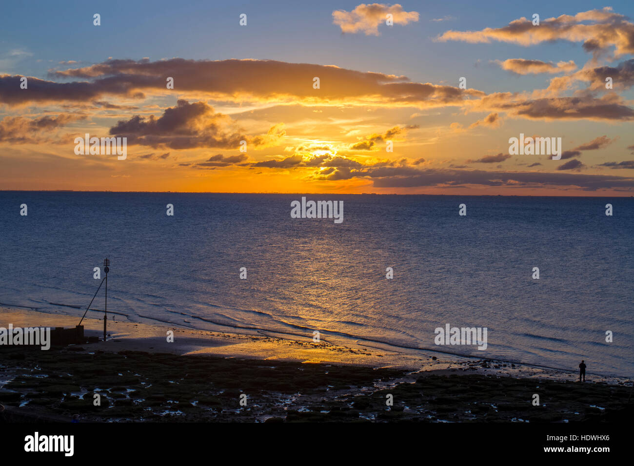 View over beach and The Wash at Sunset. Hunstanton, Norfolk, England. October. Stock Photo