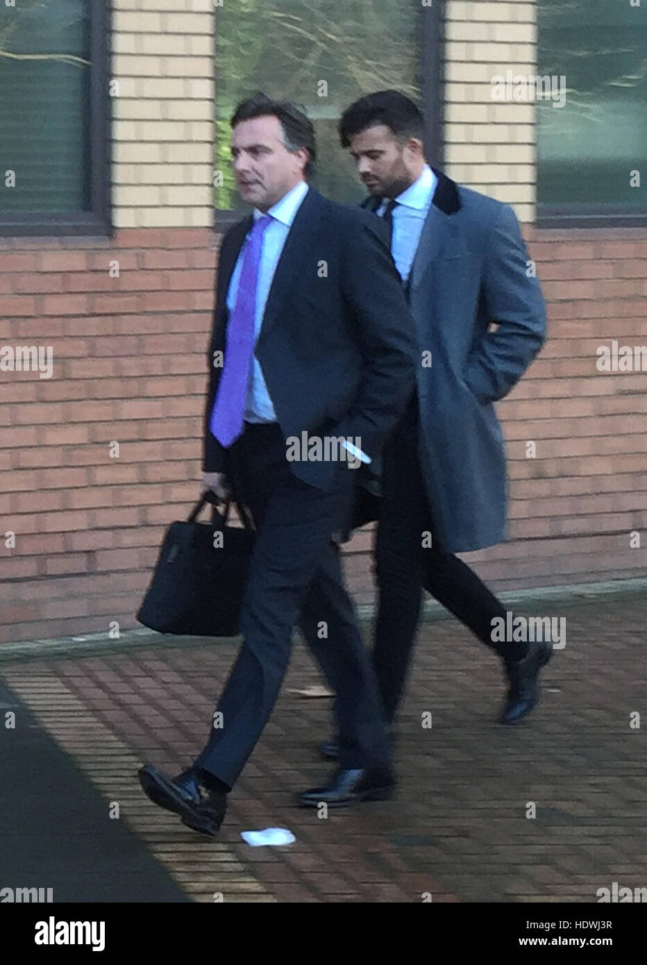 BEST QUALITY AVAILABLE Michael Hassini (right) arrives with his lawyer
