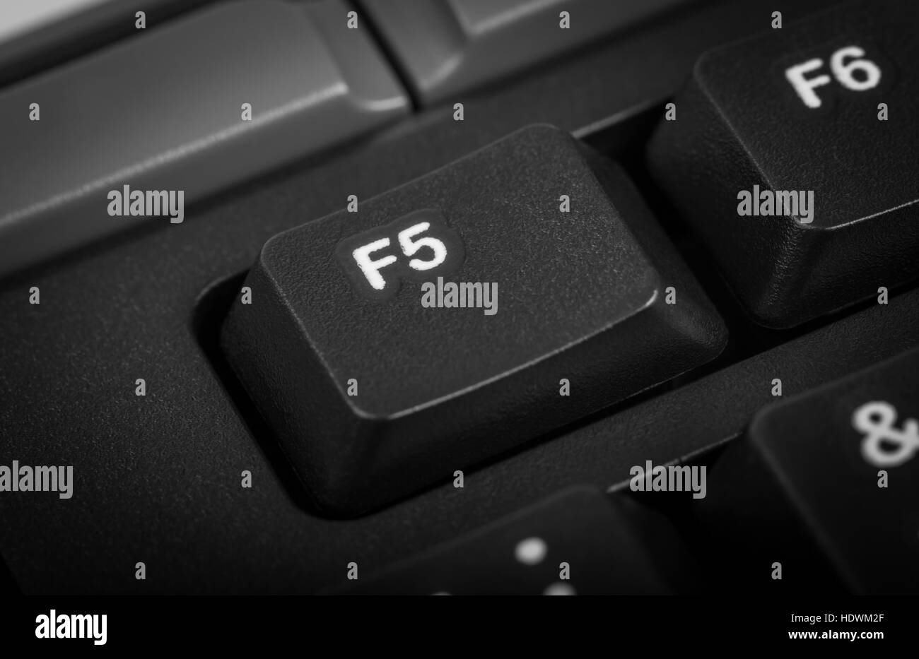 Electronic collection - detail black computer keyboard. The focus on F5 key. Stock Photo