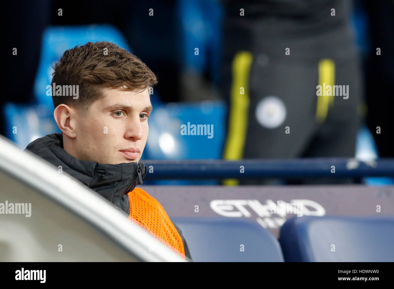 Manchester City's John Stones sits on the bench during the Premier League match at the Etihad Stadium, Manchester. PRESS ASSOCIATION Photo. Picture date: Wednesday December 14, 2016. See PA story SOCCER Man City. Photo credit should read: Martin Rickett/PA Wire. RESTRICTIONS: No use with unauthorised audio, video, data, fixture lists, club/league logos or 'live' services. Online in-match use limited to 75 images, no video emulation. No use in betting, games or single club/league/player publications. Stock Photo