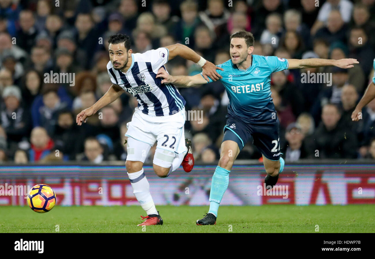 West Bromwich Albion S Nacer Chadli Left And Swansea City S Angel Stock Photo Alamy