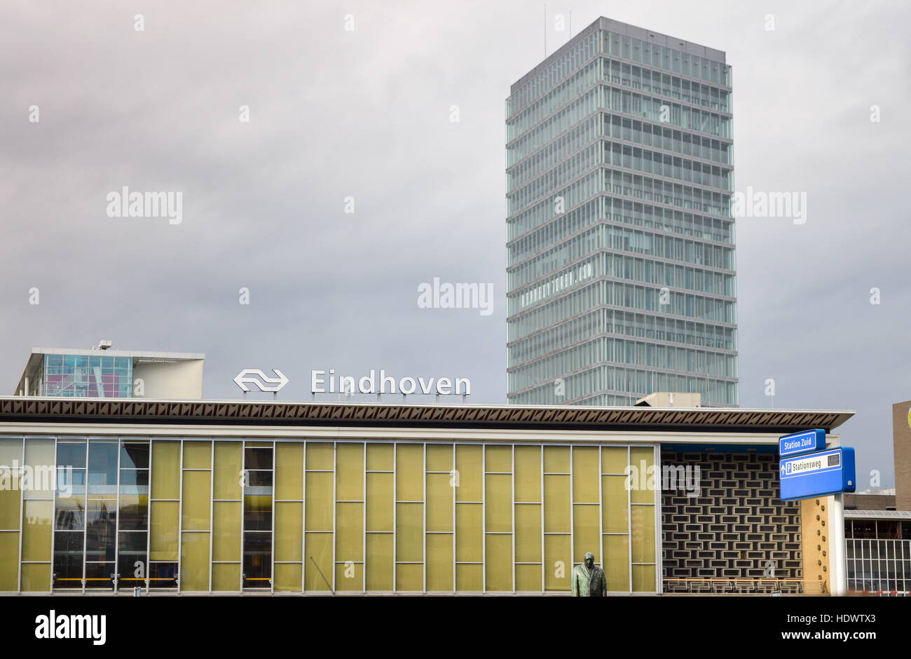 Eindhoven, the Netherlands - 15.09.2015: View at the main train station, with high business building rising behind Stock Photo