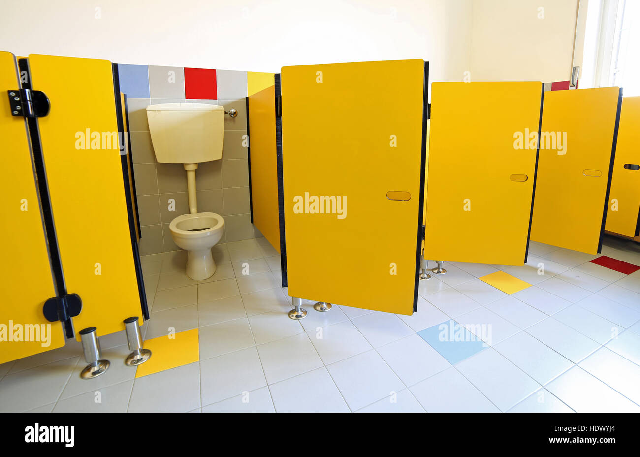 many baby baths in the bathroom of preschool without children Stock