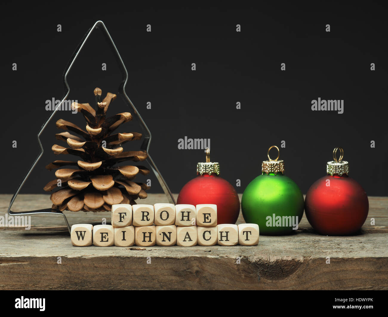 German Merry Christmas background with tree shape and small wooden