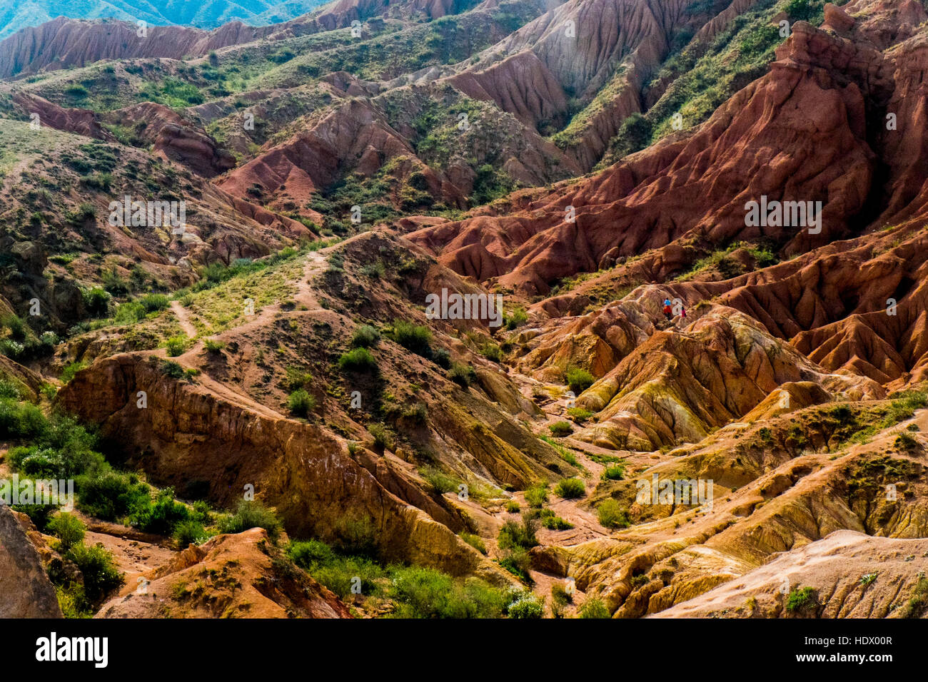 Caucasian couple hiking in rocky landscape Stock Photo - Alamy