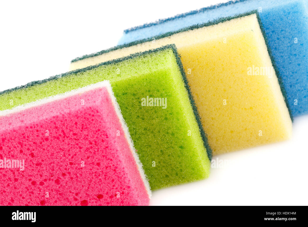 Colorful sponges isolated on white background. Stock Photo