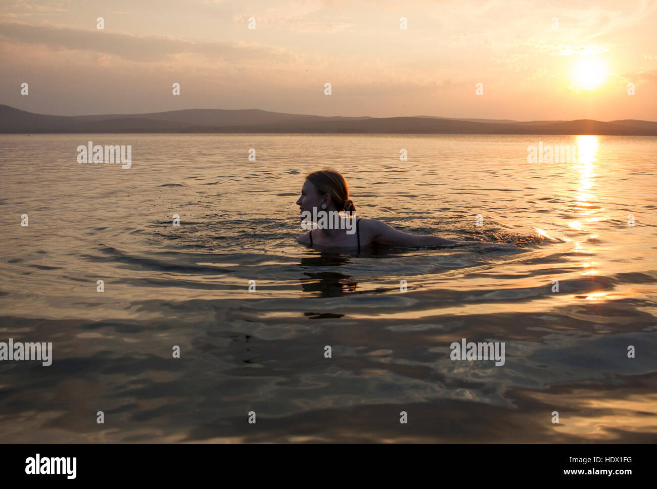 Woman swimming in river hi-res stock photography and images - Alamy