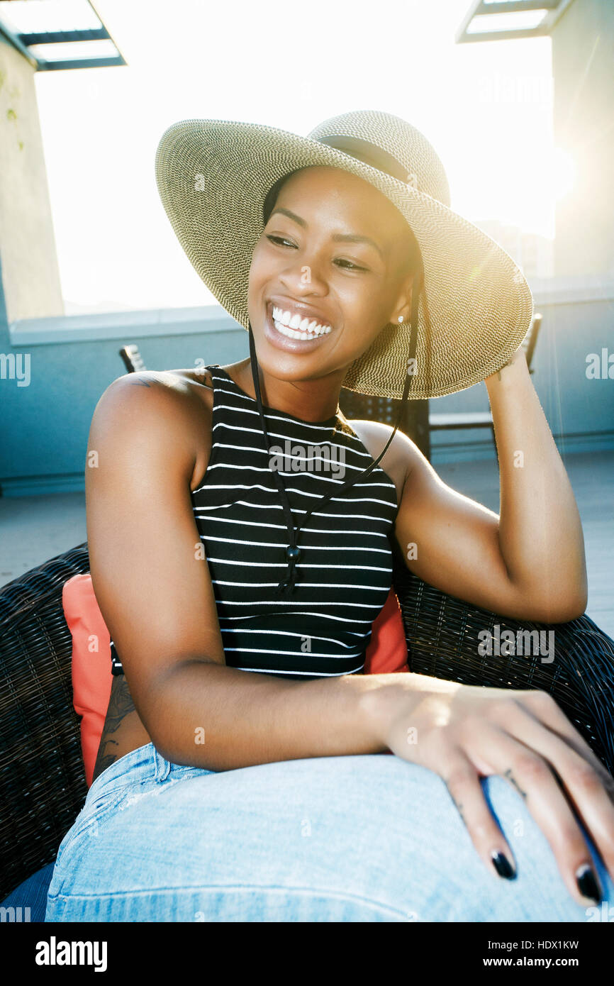 Woman wearing black hat hi-res stock photography and images - Alamy