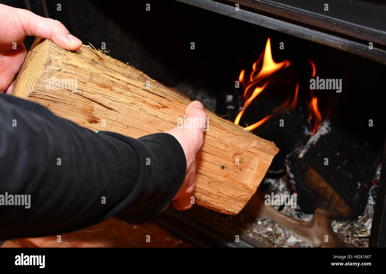Man stoking fire hires stock photography and images Alamy