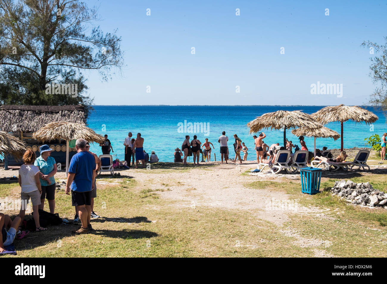 Swimmers along the Caribbean coast at Playa Giron, Bay of Pigs, Cuba Stock Photo