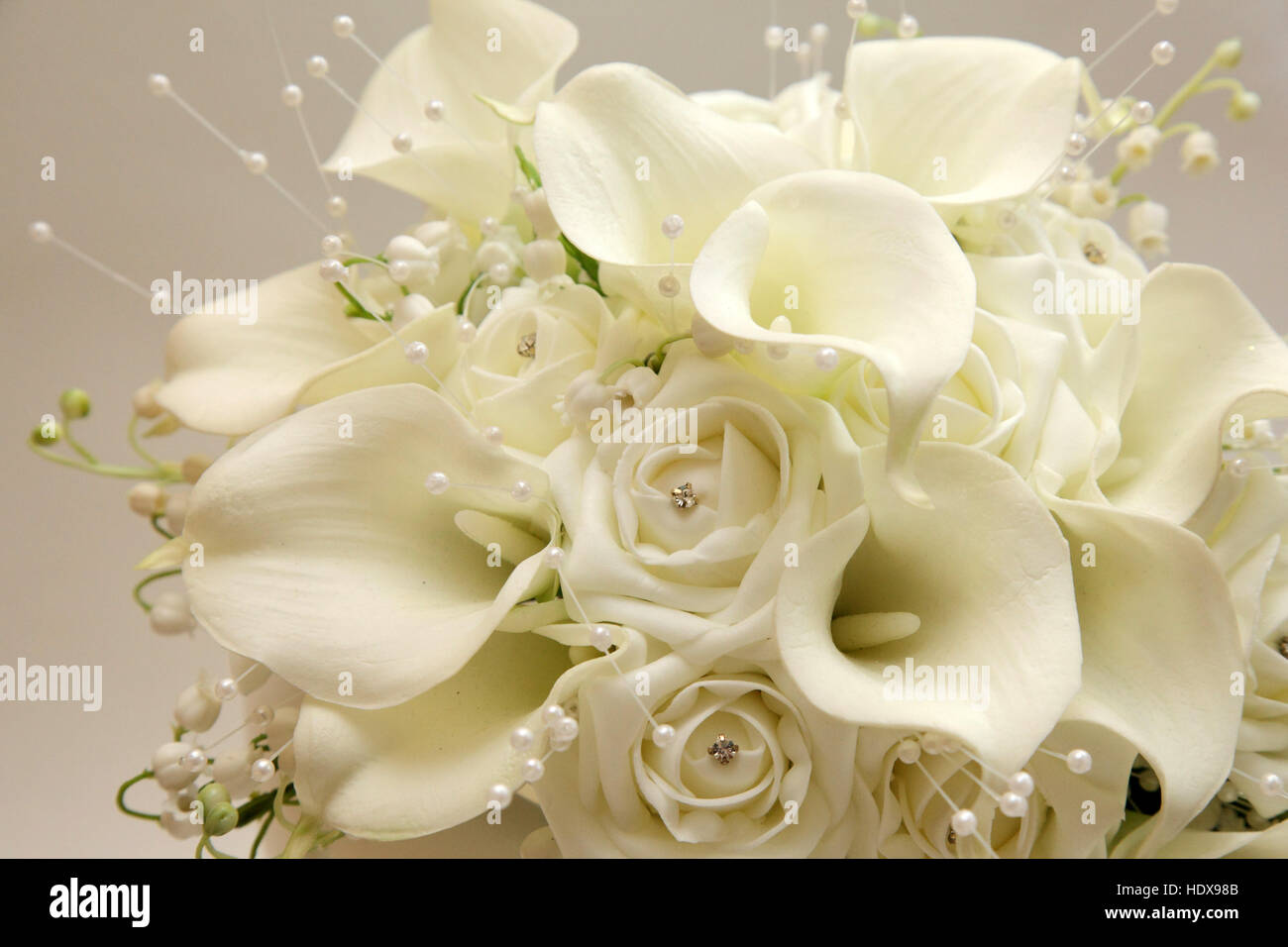 bridal bouquet with white lilies and roses