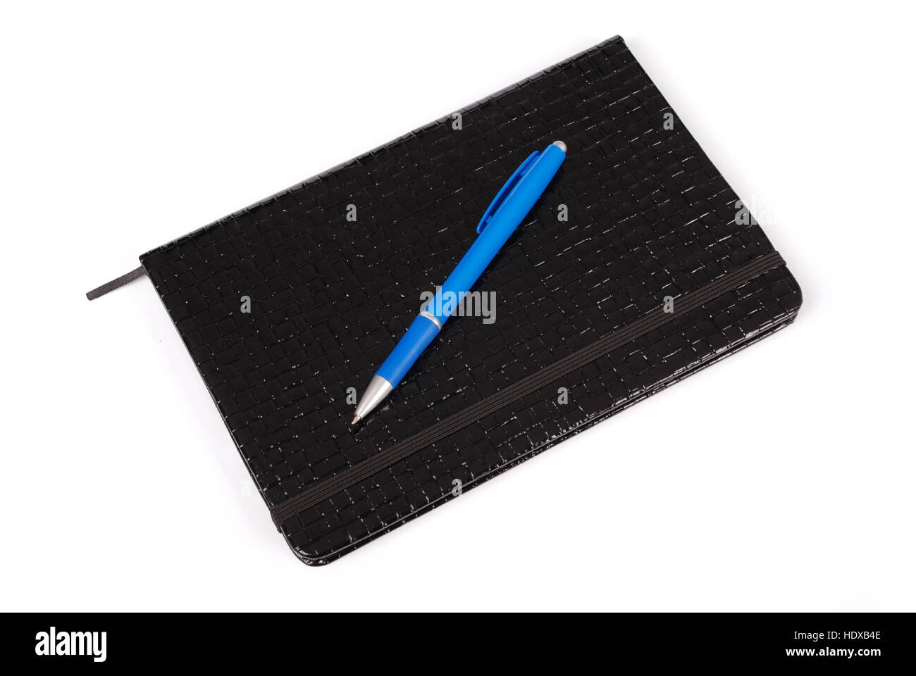 Black notebook with the blue handle facing right angle to us isolated on white background with soft shadow (Clipping path) Stock Photo