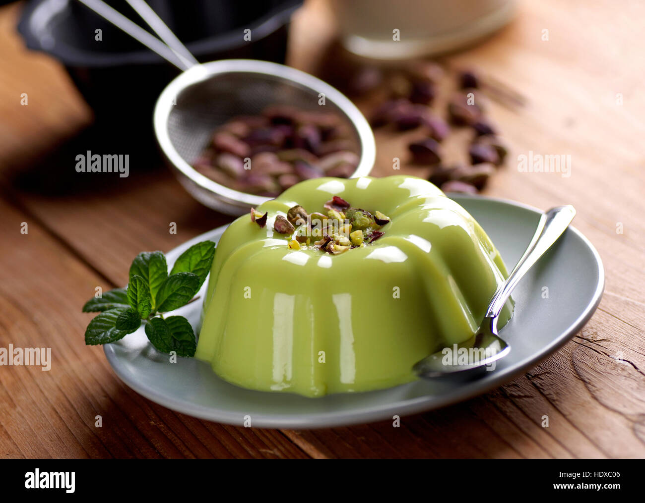 pistachio pudding with ingredients around Stock Photo Alamy