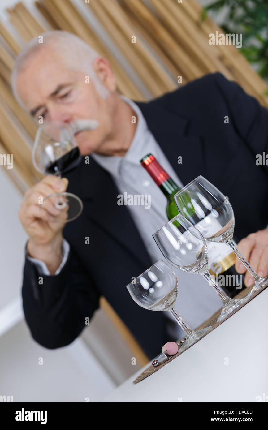wine expert tasting a vintage Stock Photo Alamy