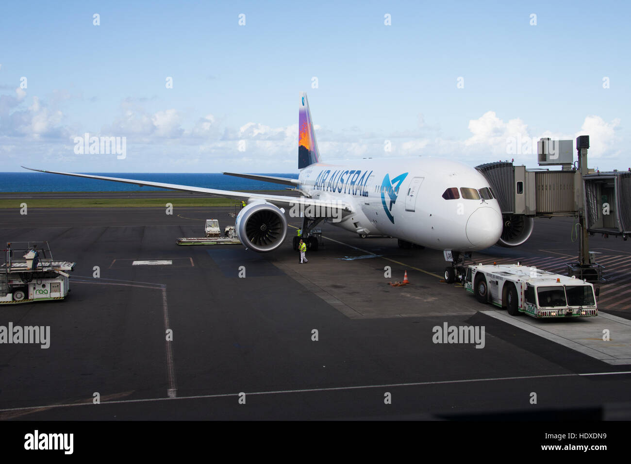 Air Austral plane at a gate at Ronald Garros Airport, Reunion Island Stock Photo