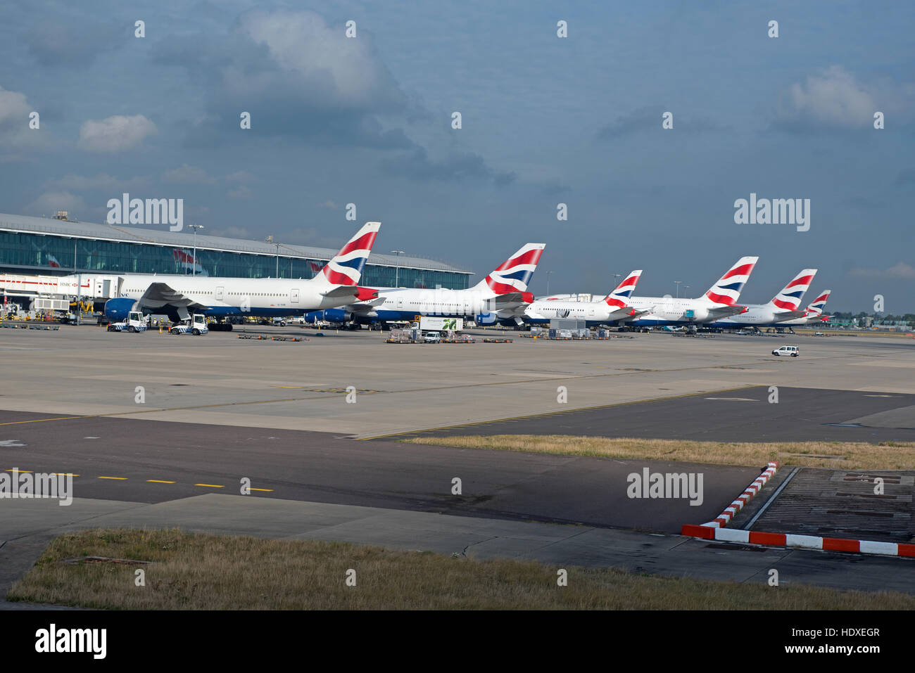 British Airways aircraft fleet parked outside terminal 2 at Heathrow Airport London UK  SCO 11,273. Stock Photo