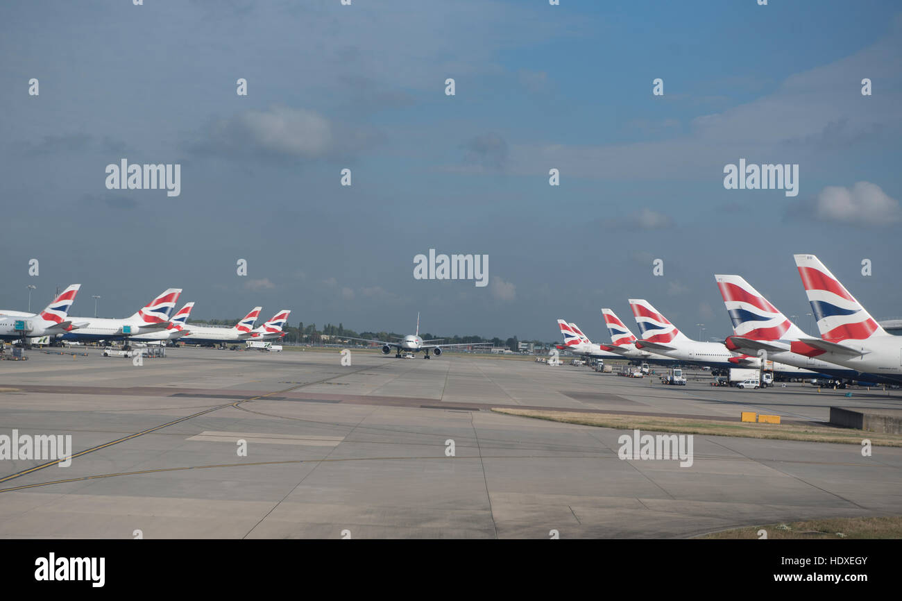 British Airways aircraft fleet parked outside terminal 2 at Heathrow Airport London UK  SCO 11,276. Stock Photo