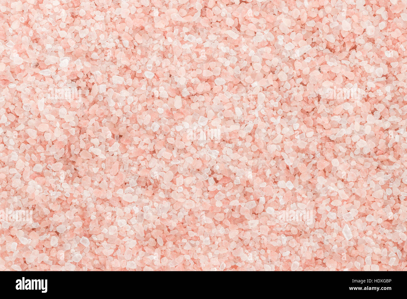Edible Pink Himalayan rock salt background Stock Photo