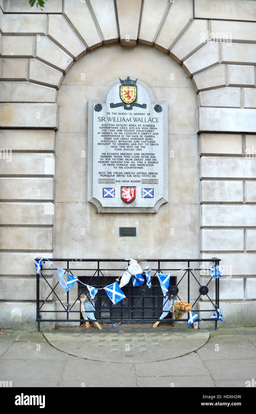London England, UK. Memorial to Sir William Wallace on the outer wall of St Bart's Hospital, Smithfield.... Stock Photo