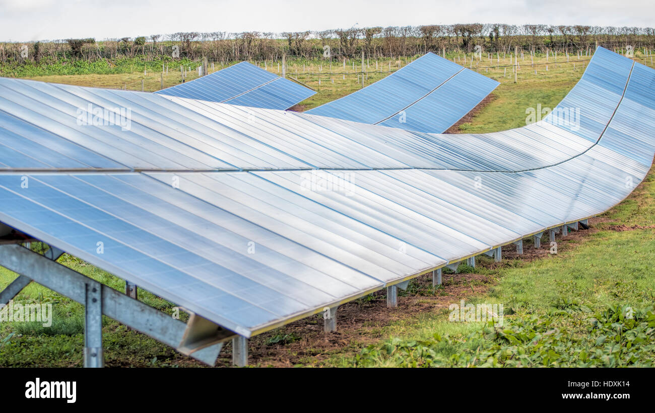 Solar Panels at solar farm power plant. Renewable sustainable energy. Stock Photo