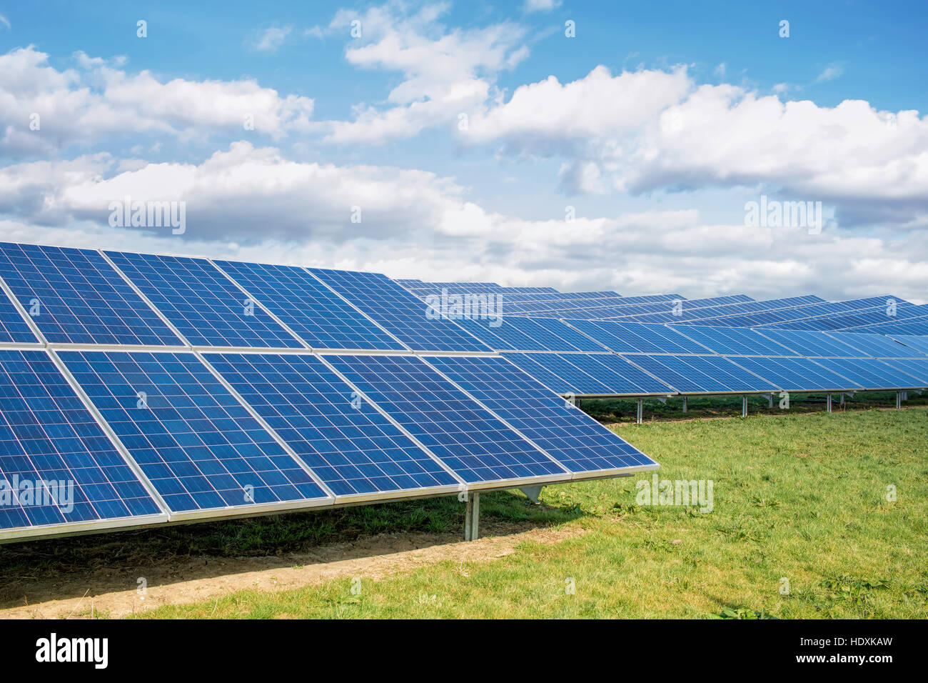 Solar Panels at solar farm power plant. Renewable sustainable energy. Stock Photo