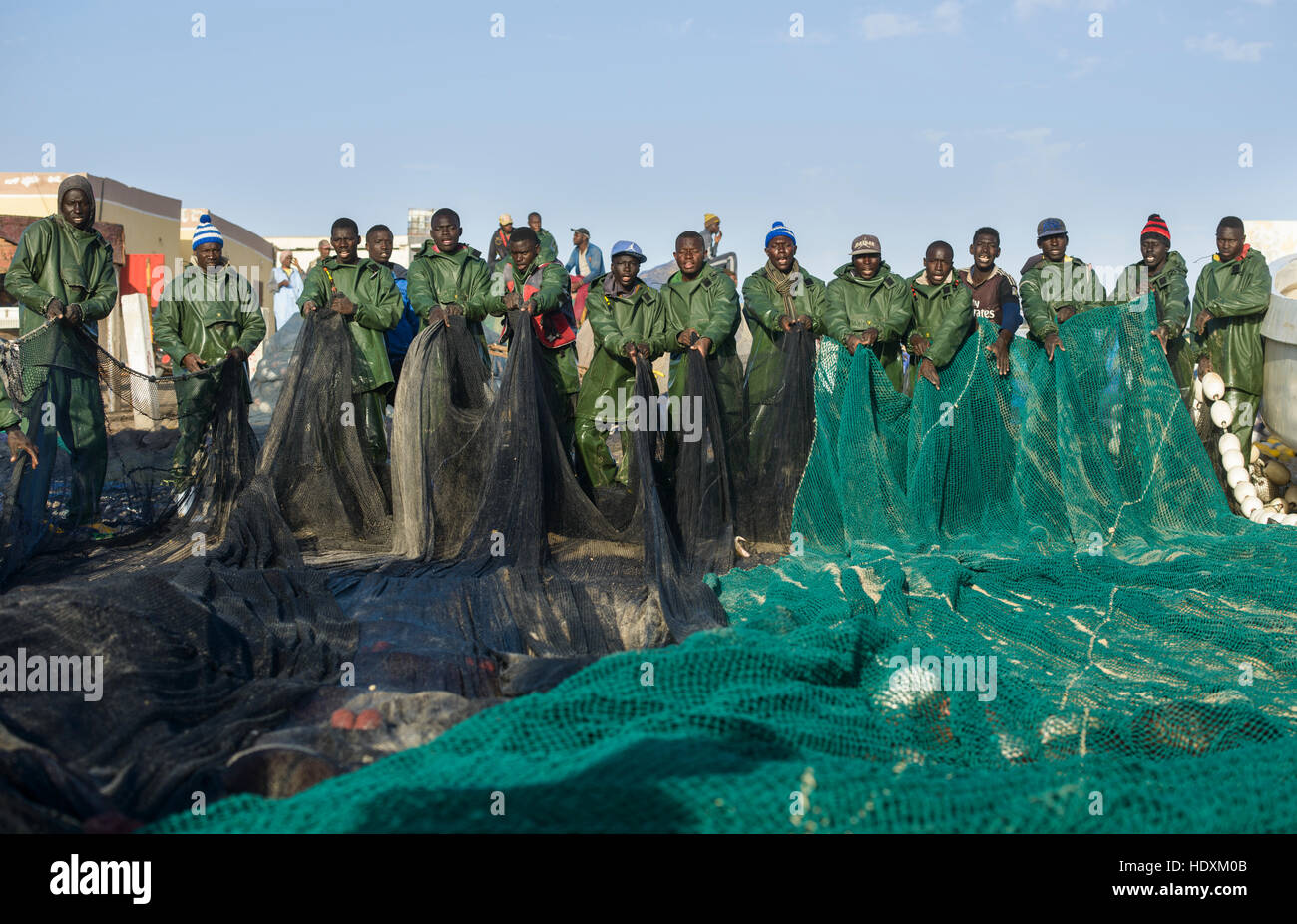 FIshermen, peddlers, boats in Nouakchott's famous fish market Stock Photo