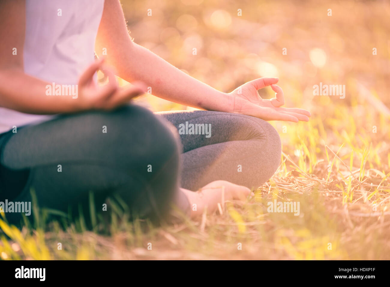 Woman doing yoga exercises Stock Photo