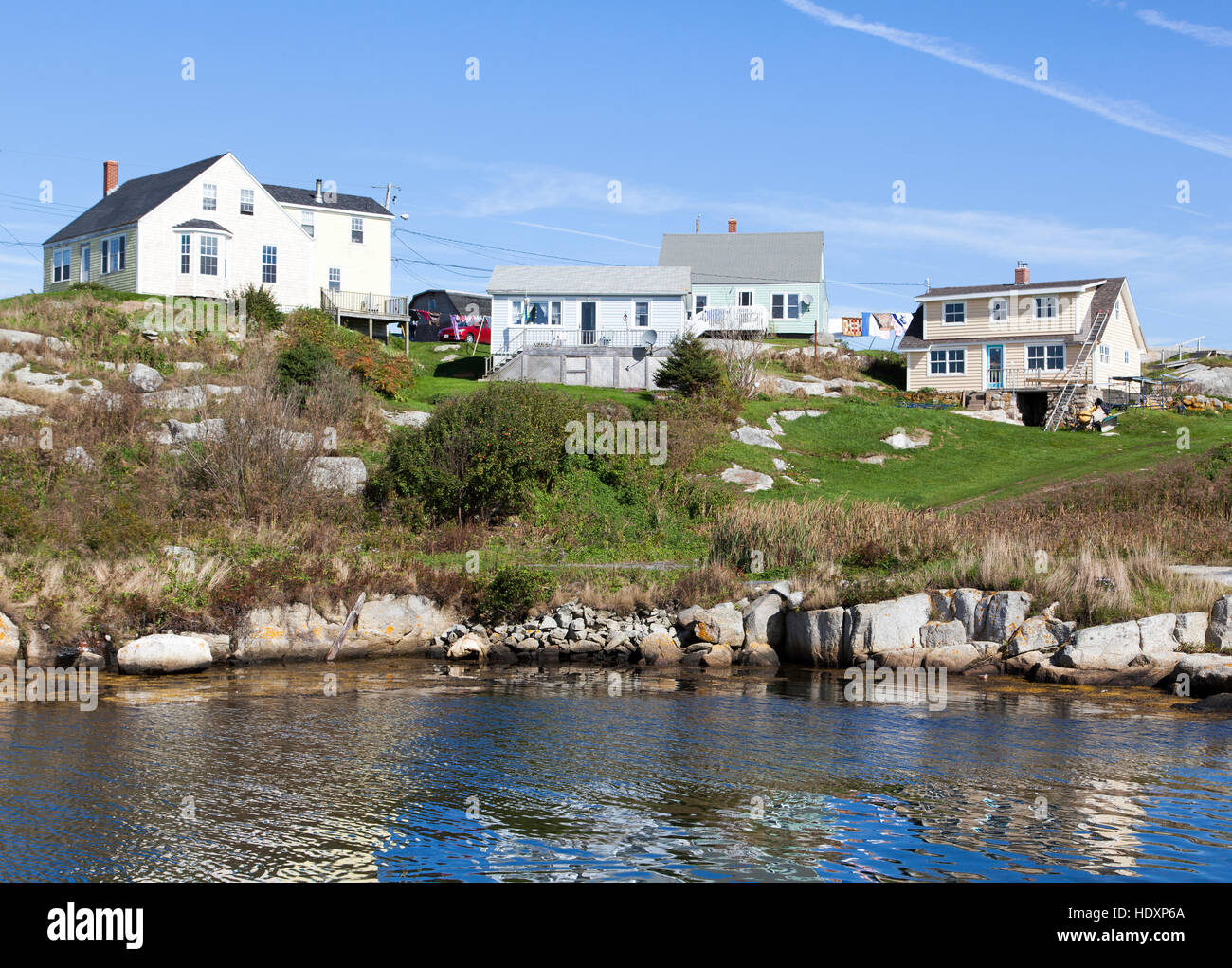 Wooden houses of Peggy's Cove village, famous touristic destination in Nova Scotia (Canada). Stock Photo