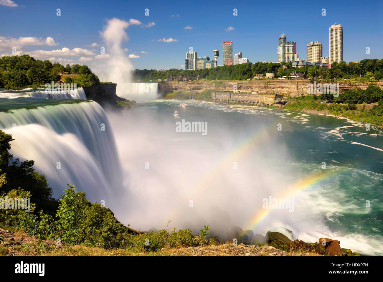 The view of Niagara falls and spectacular rainbow. Stock Photo