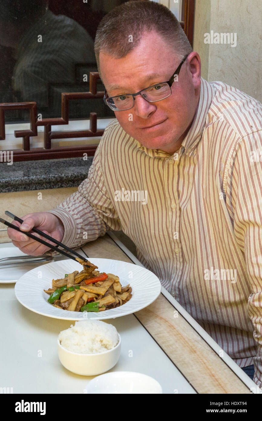 English customer at chinese restaurant, Zhongwei, Ningxia, China Stock Photo