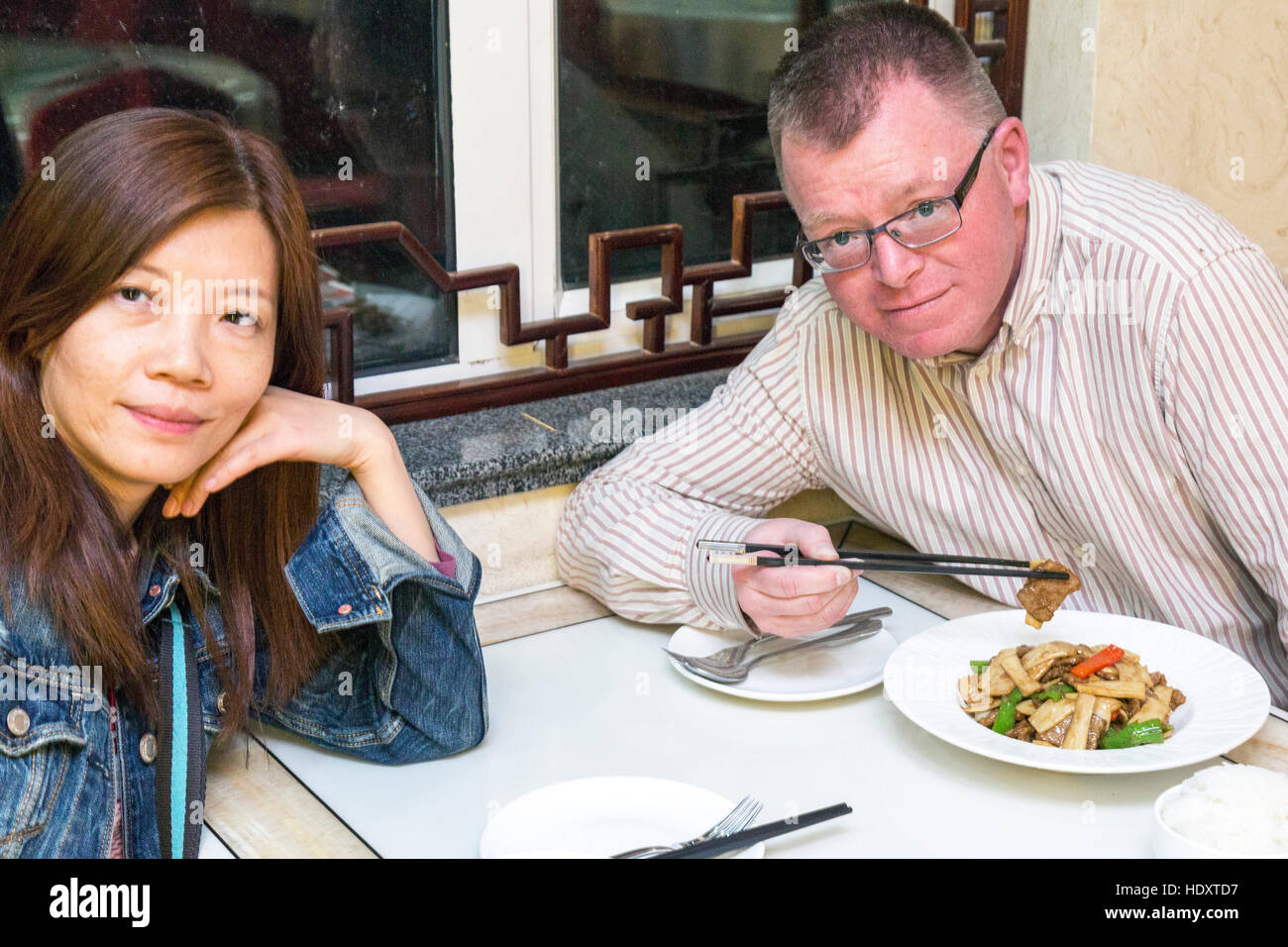 English and Chinese couple restaurant, Zhongwei, Ningxia, China Stock Photo