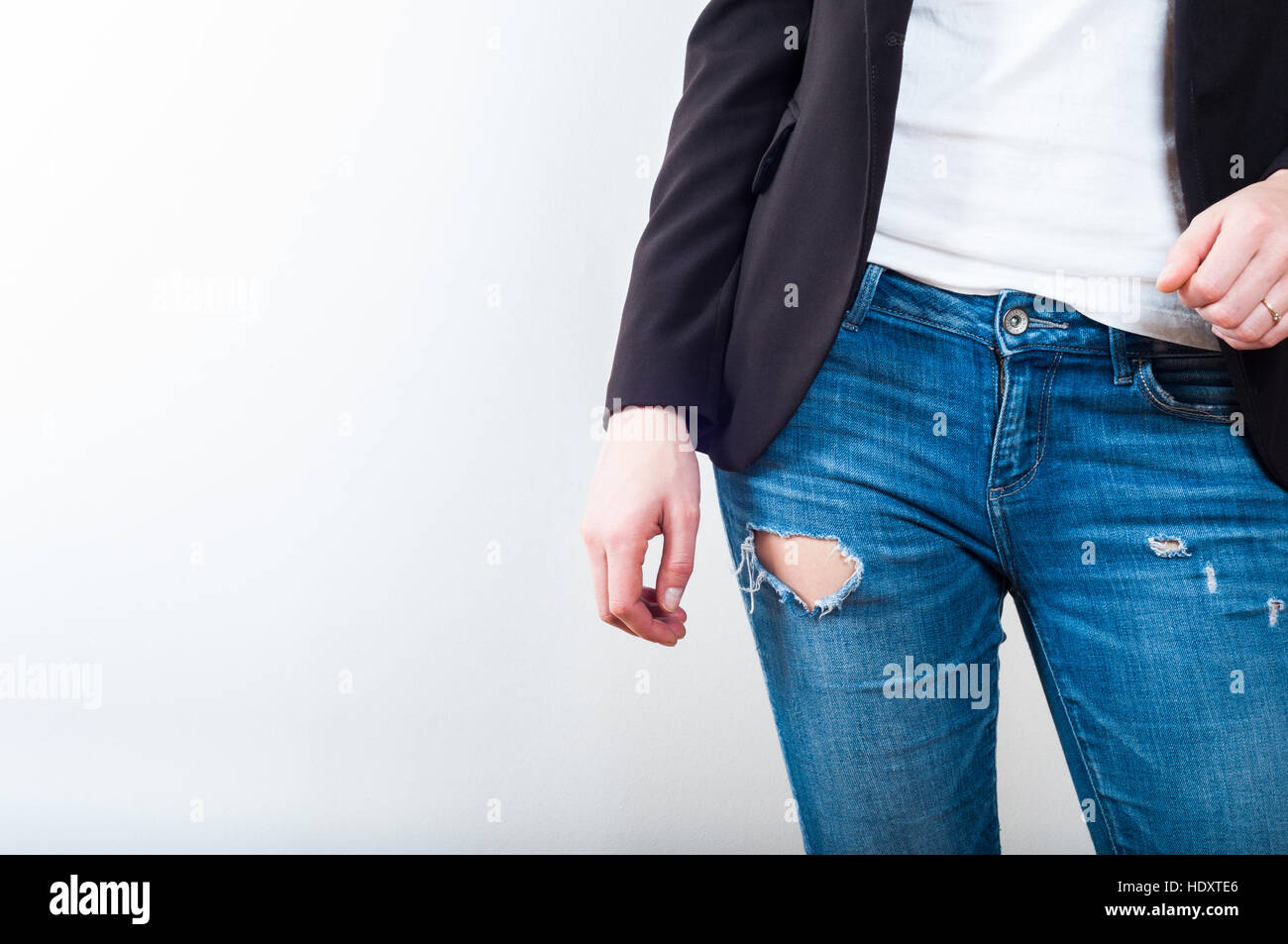 Woman in casual business suit on white background Stock Photo - Alamy