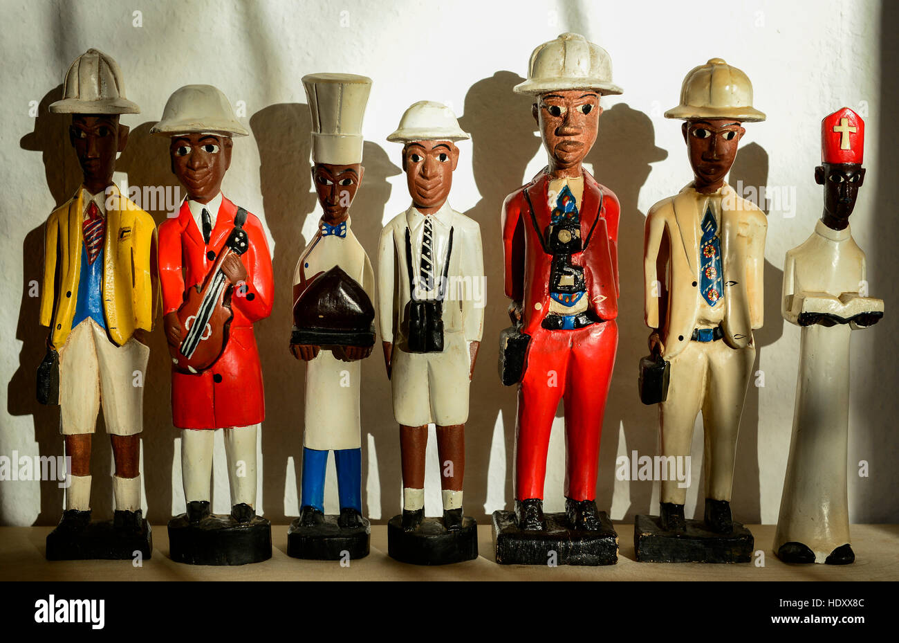 African Souvenirs, colonial wooden figures showing different Stock