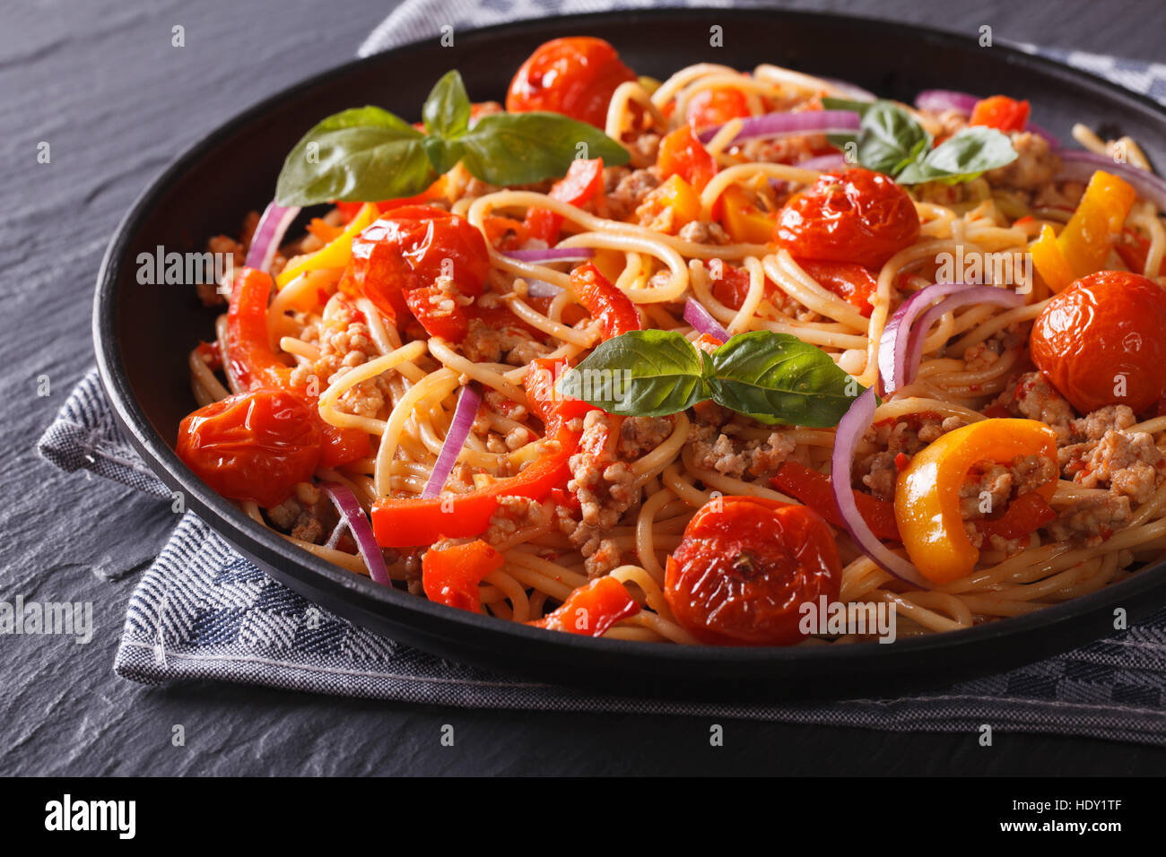 Italian food: pasta with minced meat and vegetables close-up. horizontal Stock Photo