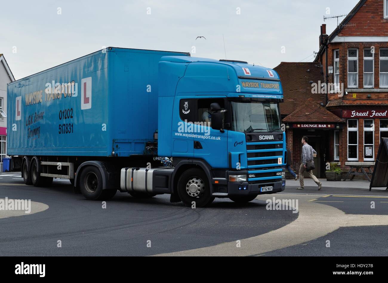 HGV learner driver negotiates roundabout in Poole, Dorset Stock Photo