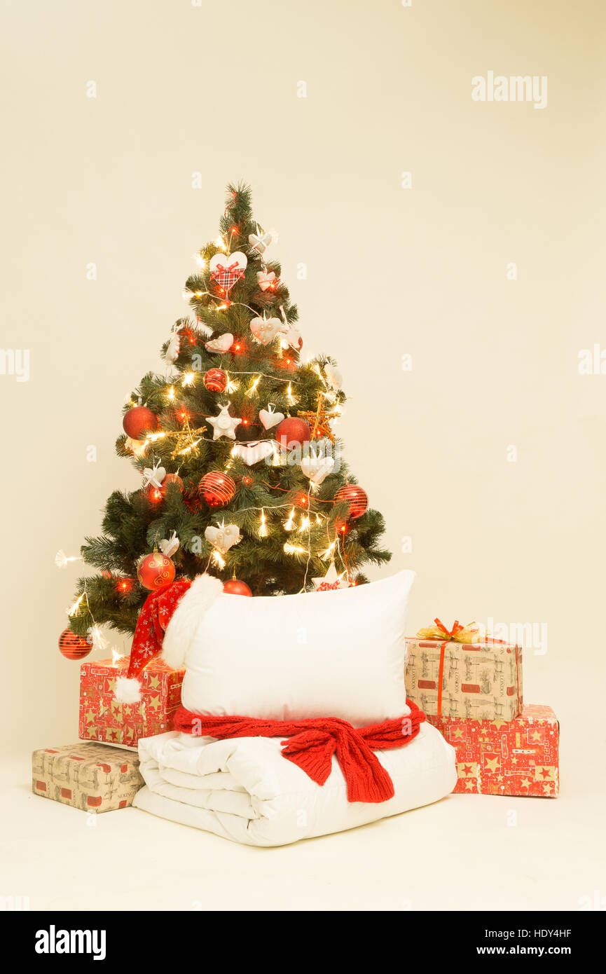 Decorated Christmas tree and gifts on white background Stock Photo - Alamy