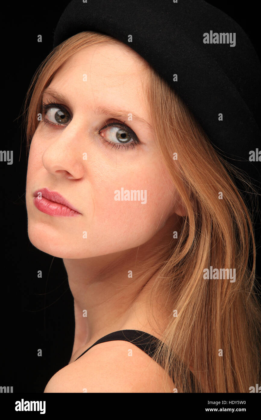 portrait of a pretty young girl with black hat Stock Photo - Alamy