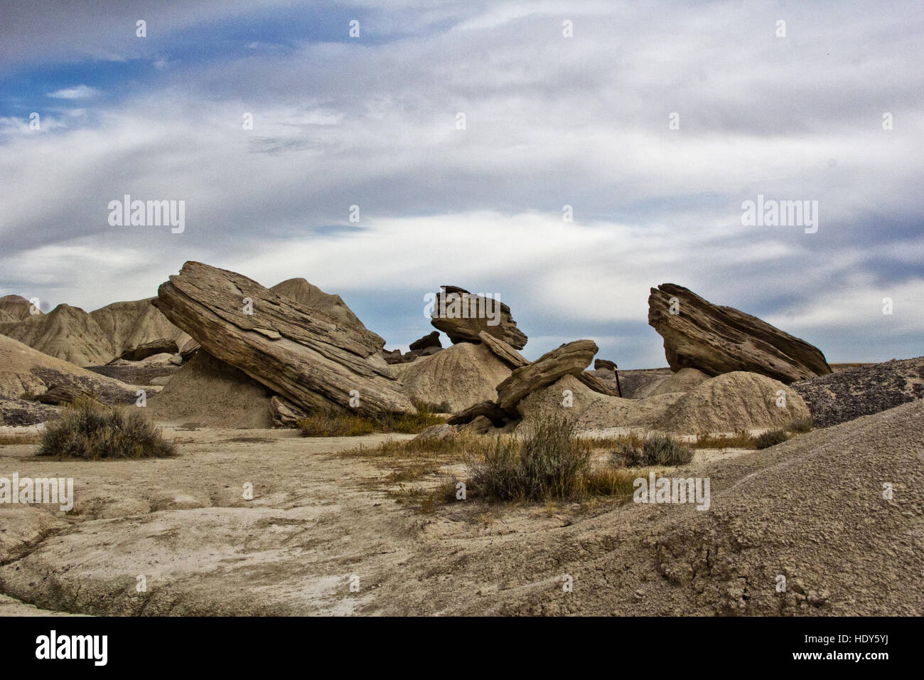 Follow the path to the badlands landscape past these fallen rock formations that once resembled toadstools in Toadstool Park Stock Photo