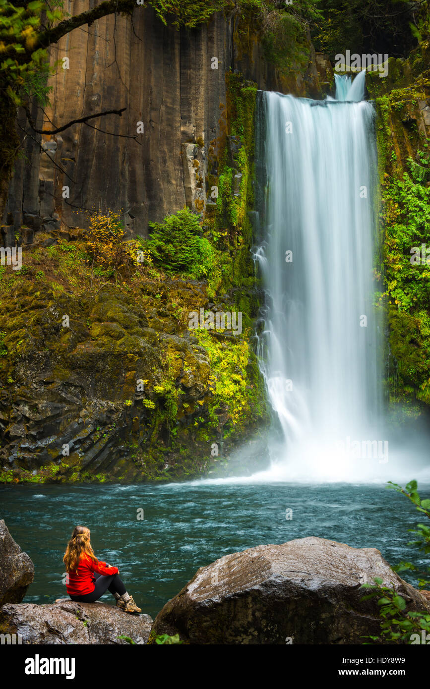 Tourist admiring Toketee Falls Visiting Oregon Stock Photo
