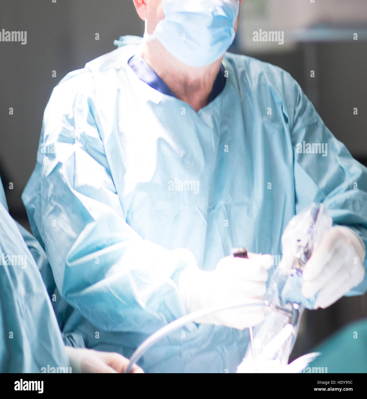 Surgeon in hospital surgery operating theater emergency room in blue ...