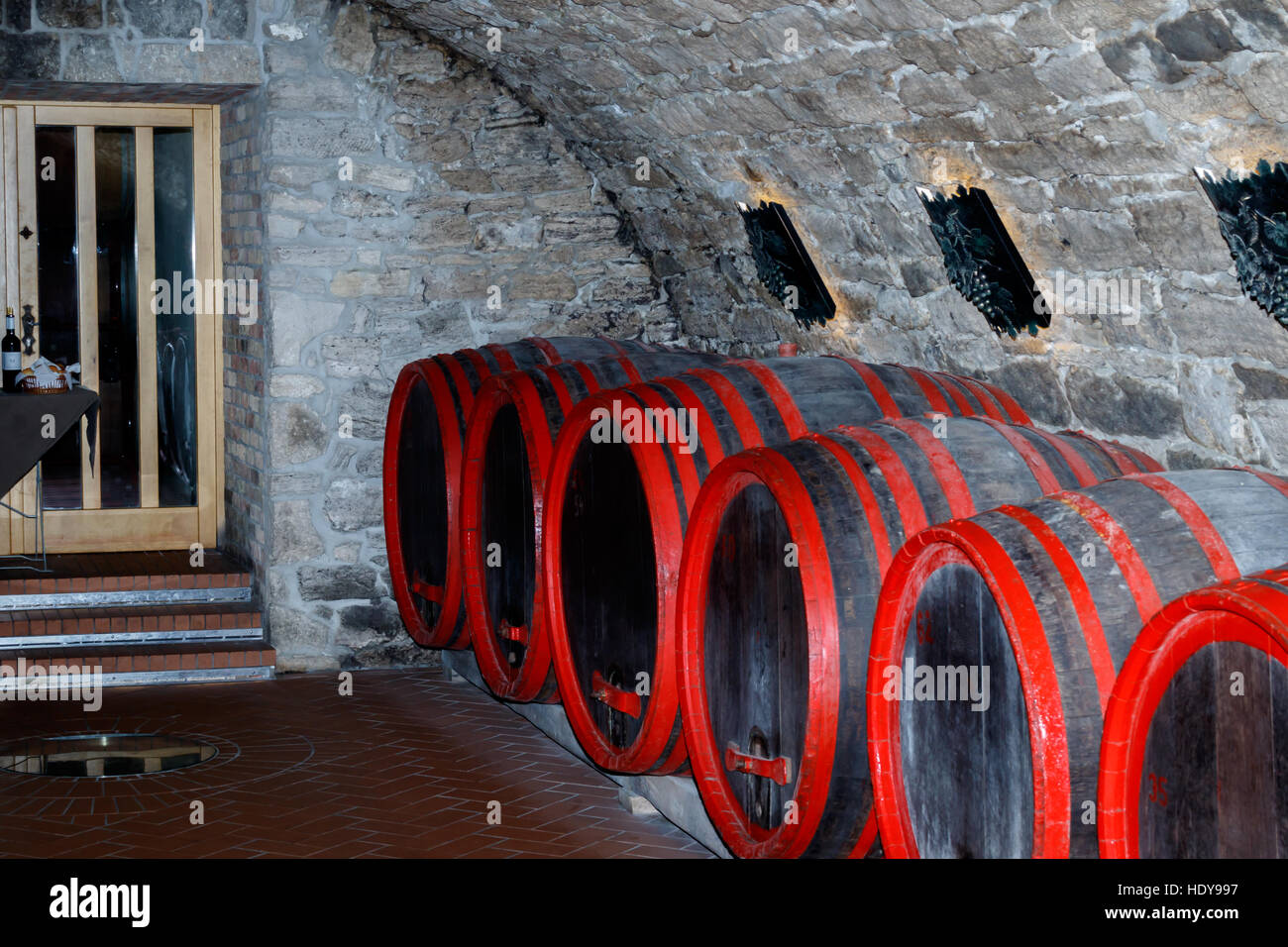 A row of wooden barrels in a wine cellar Stock Photo - Alamy