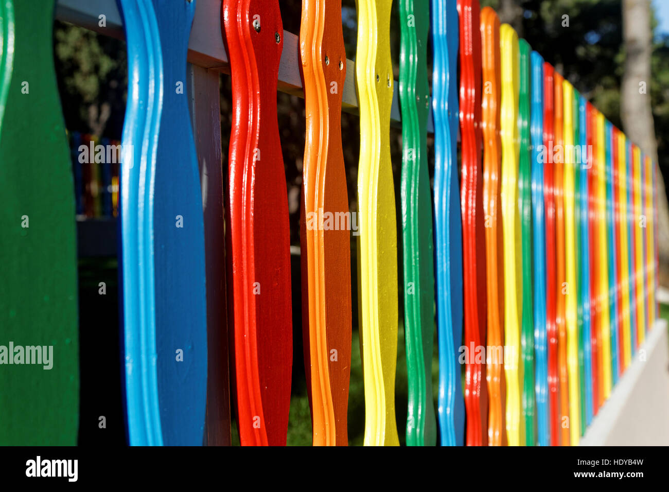 new wooden multicolored fence Stock Photo