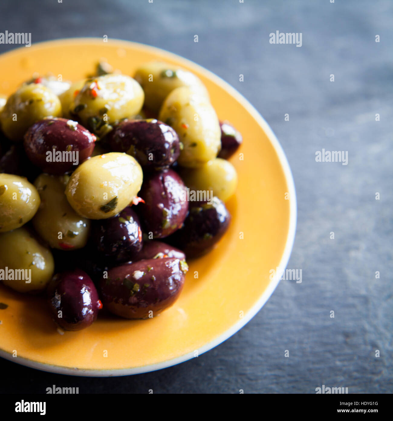 Green and purple Kalamata Greek olives marinated antipasti, European