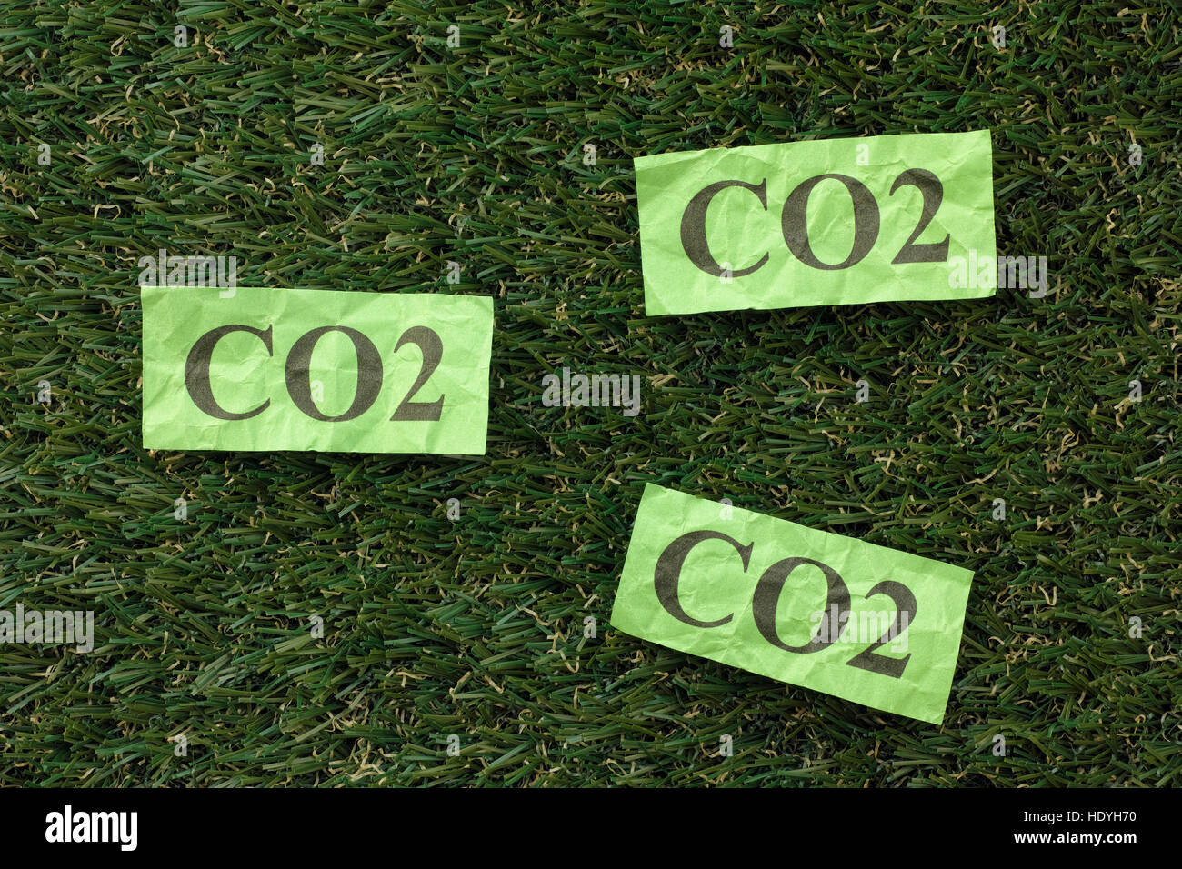 Carbon Dioxide Cloud (CO2) on a green grass. Concept image. Close up. Stock Photo