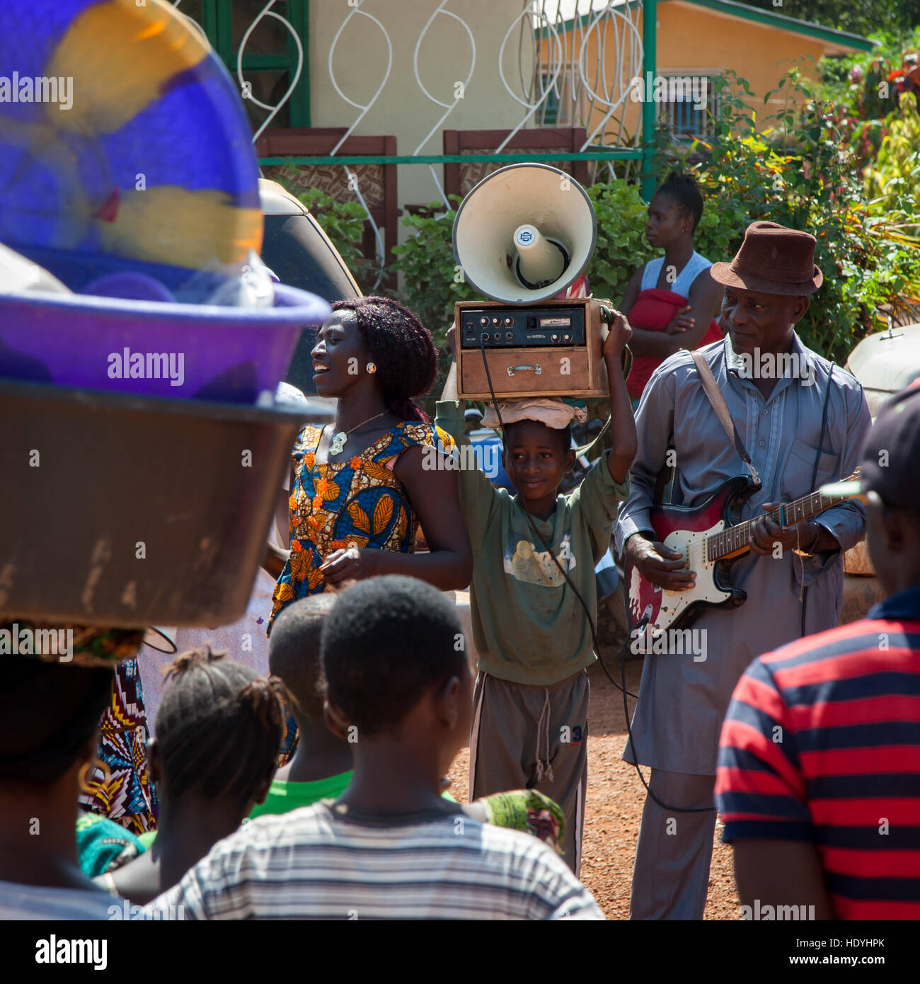 African dancer with musicians in Kabala, Sierra Leone Stock Photo