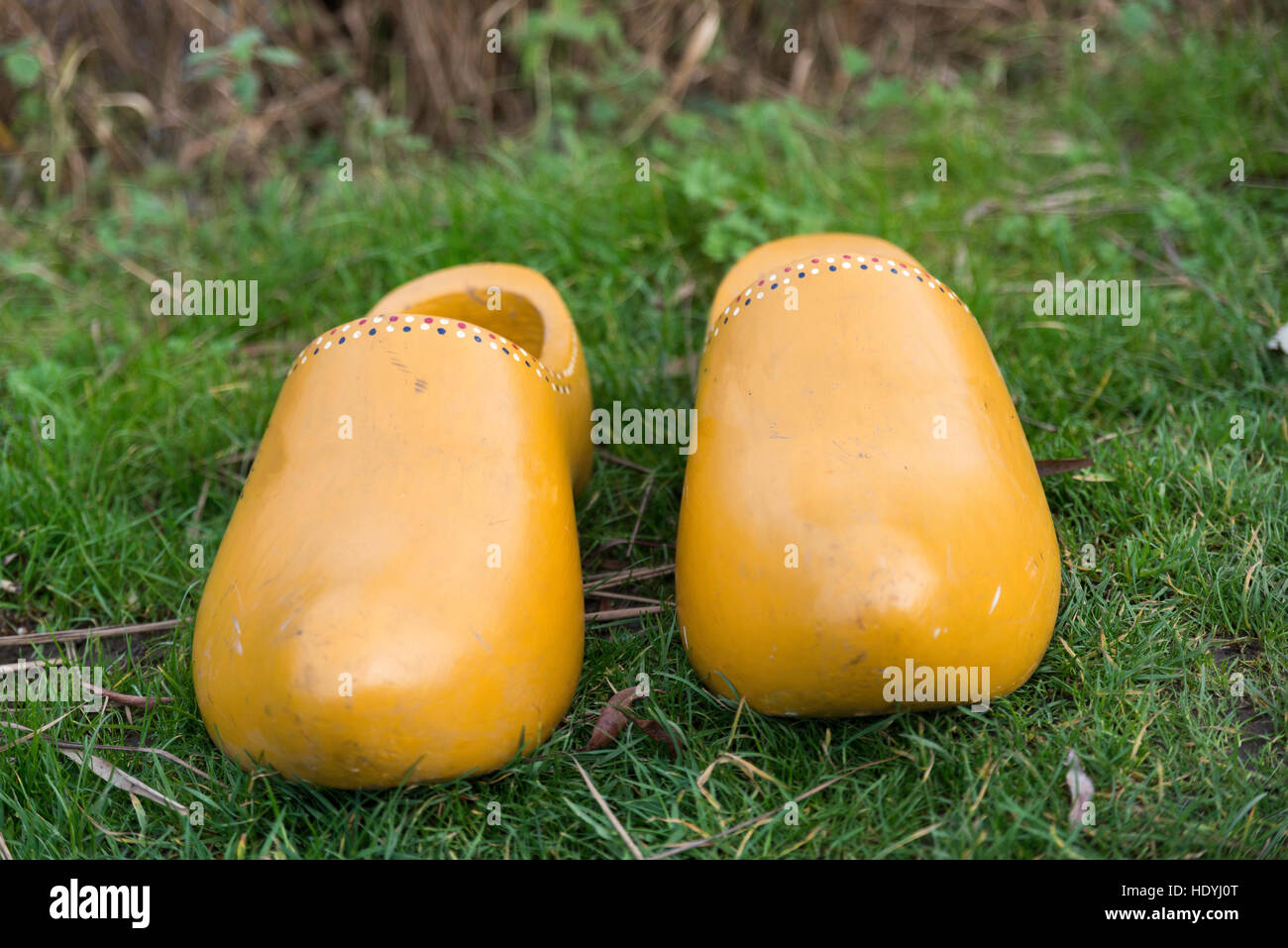 Wooden shoes yellow grass hi-res stock photography and images - Alamy